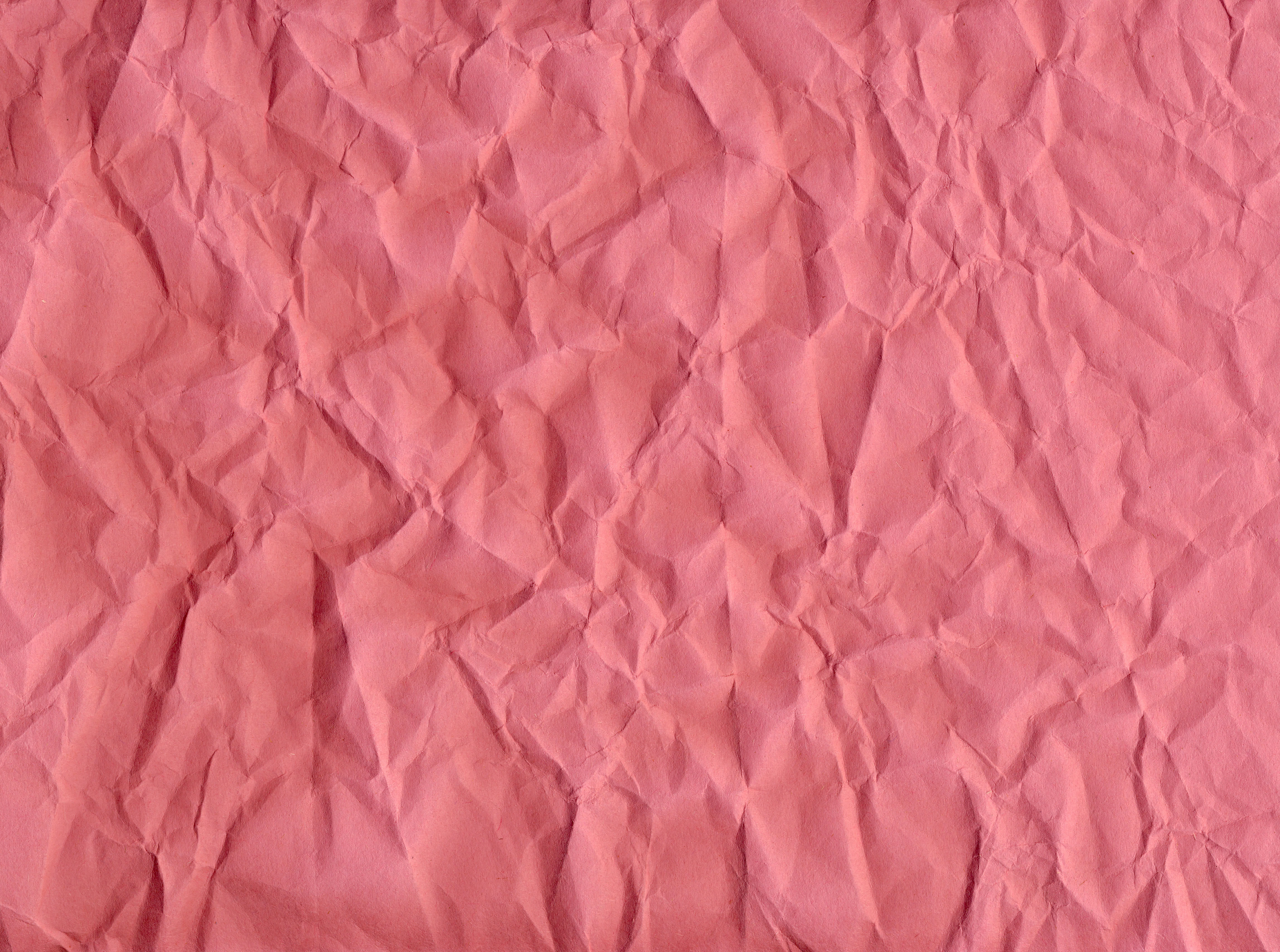 pink creased paper texture background